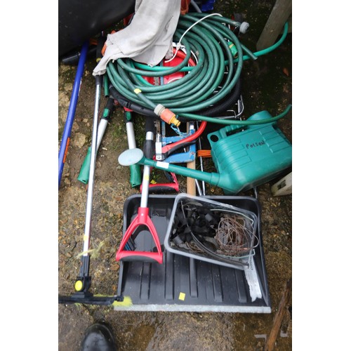 55 - Garden misc, incl hosepipe, 3x snow shovels, watering can, saws shears, petrol cans, fleece, etc