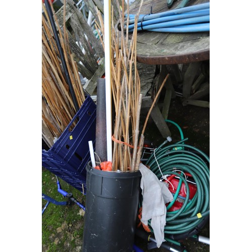 55 - Garden misc, incl hosepipe, 3x snow shovels, watering can, saws shears, petrol cans, fleece, etc