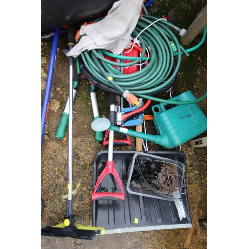 55 - Garden misc, incl hosepipe, 3x snow shovels, watering can, saws shears, petrol cans, fleece, etc