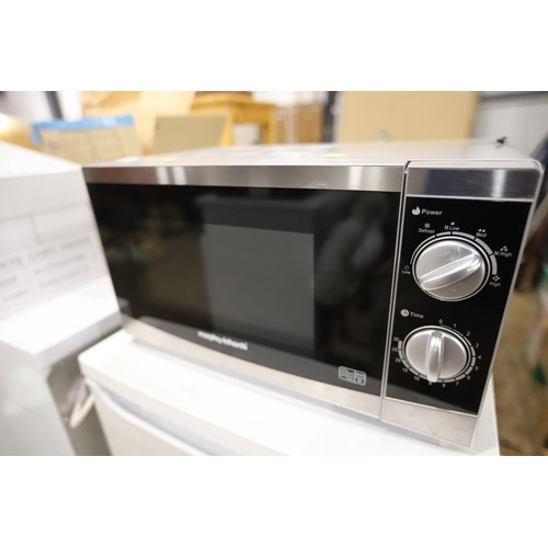 211 - Morphy Richards microwave - warranted until 12 noon Tuesday following the above sale