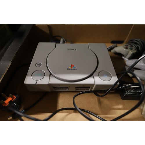 252 - Sony PlayStation 1 with 3 controllers & 3 games