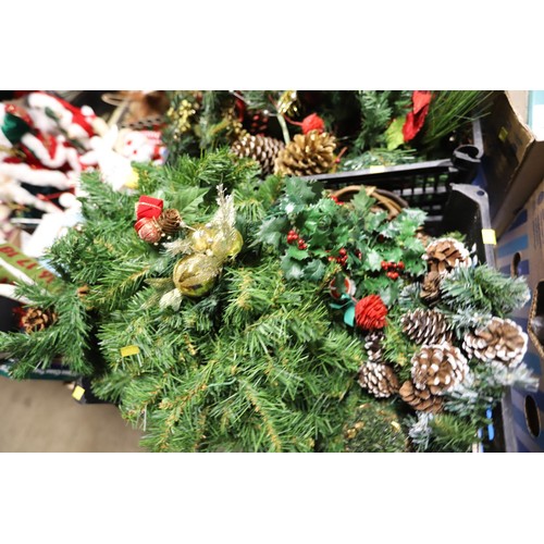 363 - 2 crates of garlands, holly leaves, berries, various wreaths, etc