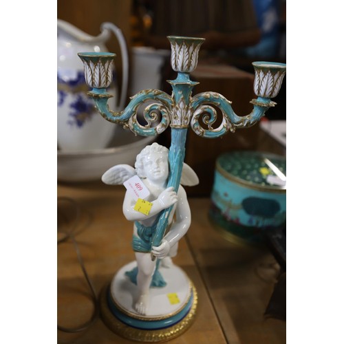 409 - Cherub candelabra, a/f