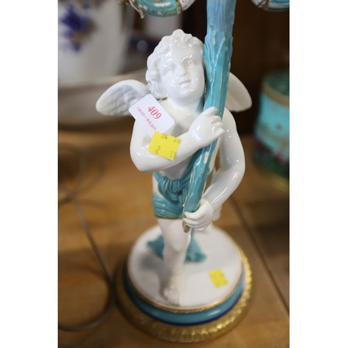 409 - Cherub candelabra, a/f