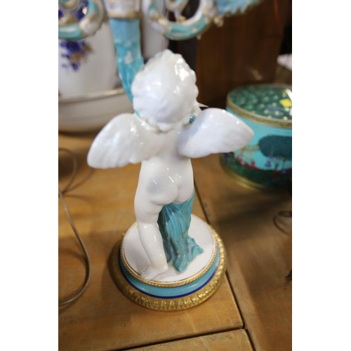 409 - Cherub candelabra, a/f