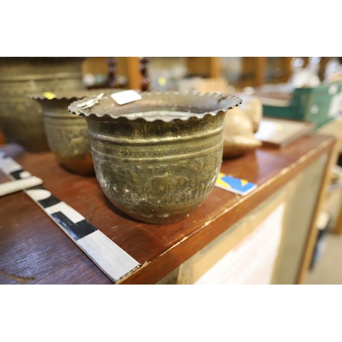 606 - 3 Indian embossed brass pot/planters