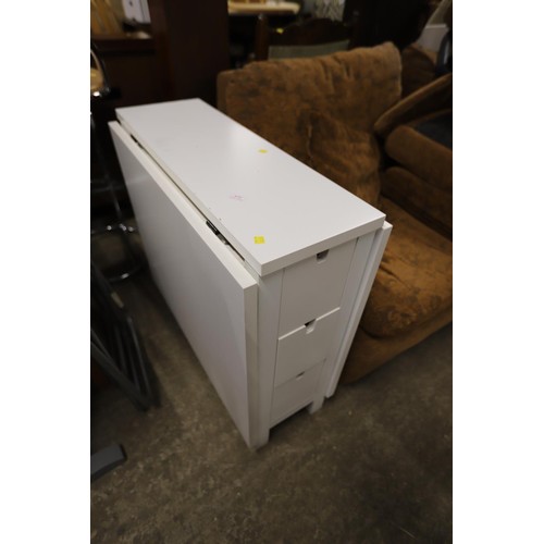 672 - Ikea white drop leaf table with 6 small drawers & pair of folding chairs