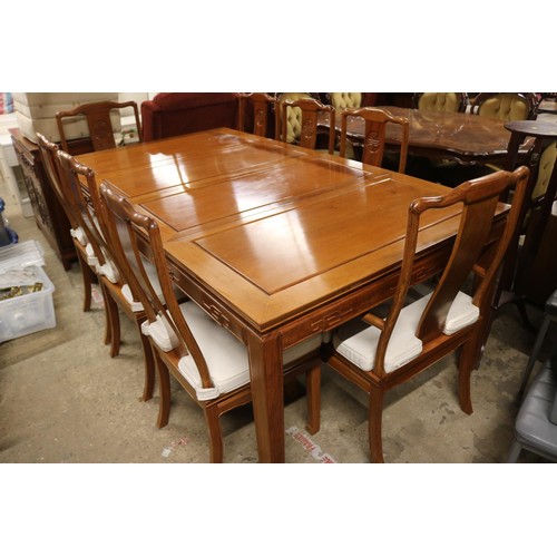 586 - Oriental hardwood dinning table & 8 chairs