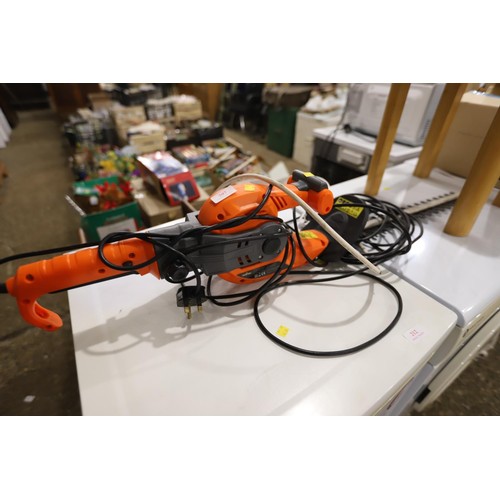 82 - Electric hedge cutter - warranted until 12 noon Tuesday following the above sale