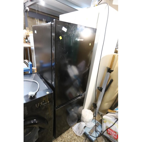 74 - Fridgemaster fridge/freezer - warranted until 12 noon Tuesday following the above sale