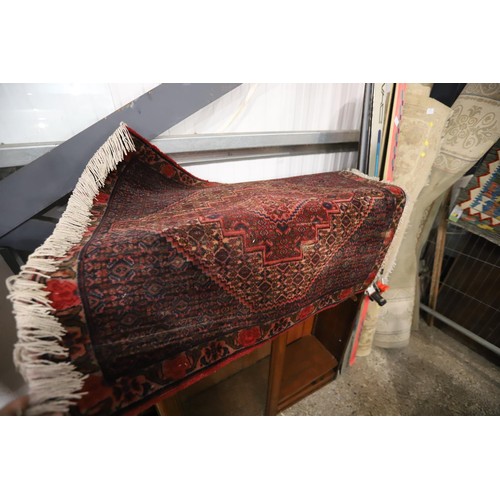 89 - 2 patterned rugs