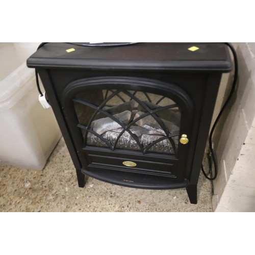 102 - Black electric fire - warranted until 12 noon Tuesday following the above sale