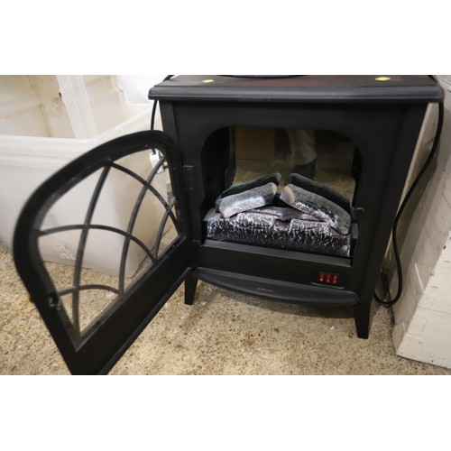 102 - Black electric fire - warranted until 12 noon Tuesday following the above sale