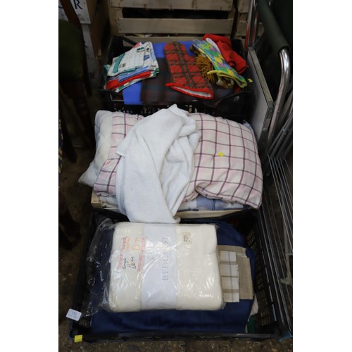 153 - 4 trays, incl blanket, pillows, materials, etc