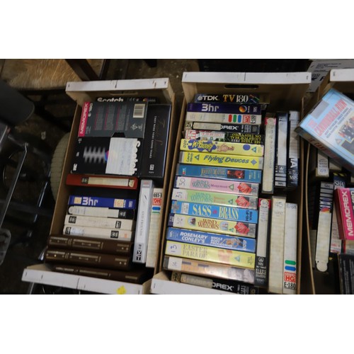 160 - 12 small tray sof various pre-recorded videos, tapes, re-recordable videos, etc