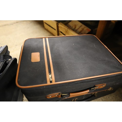 288 - Various suitcases & bags