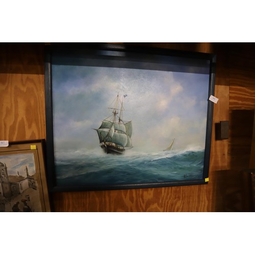 466 - Oil painting of ships at sea, signed K Dobson