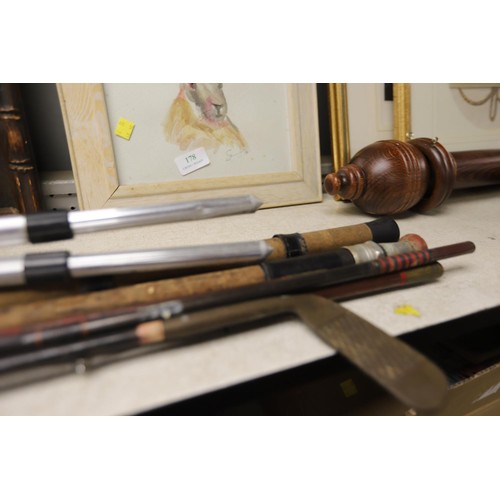 103 - Bundle of fishing rods & rod rest