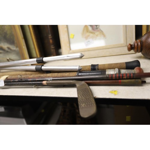 103 - Bundle of fishing rods & rod rest