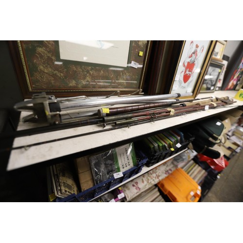 103 - Bundle of fishing rods & rod rest