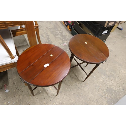 563 - Pair of small folding round tables