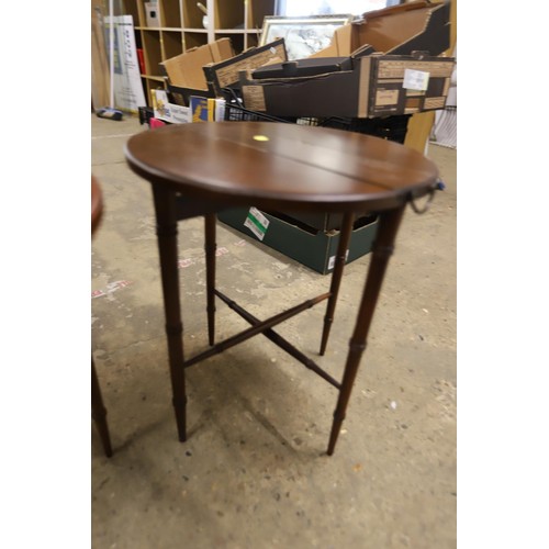 563 - Pair of small folding round tables