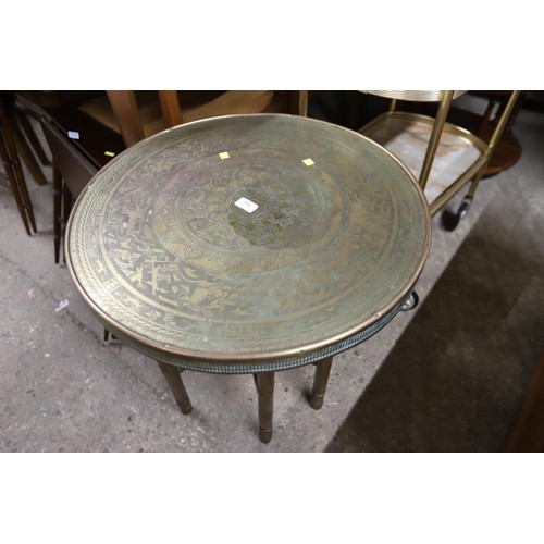 564 - Brass top round table with folding wooden base