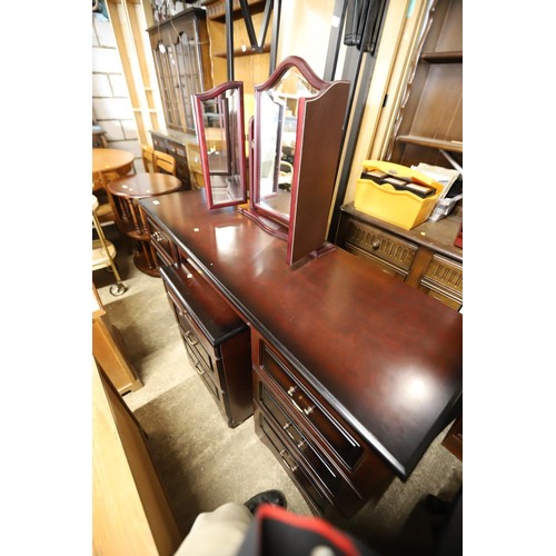 568 - Dark wooden dressing table with triple mirror, bedside chest, headboard