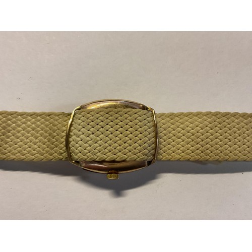 390 - Hallmarked 9ct gold case watch with fabric strap