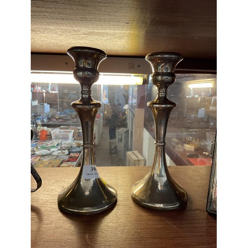 396 - Pair of silver hallmarked candle sticks a/f