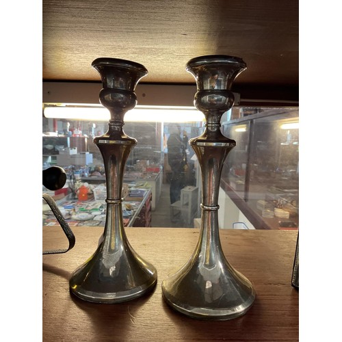 396 - Pair of silver hallmarked candle sticks a/f