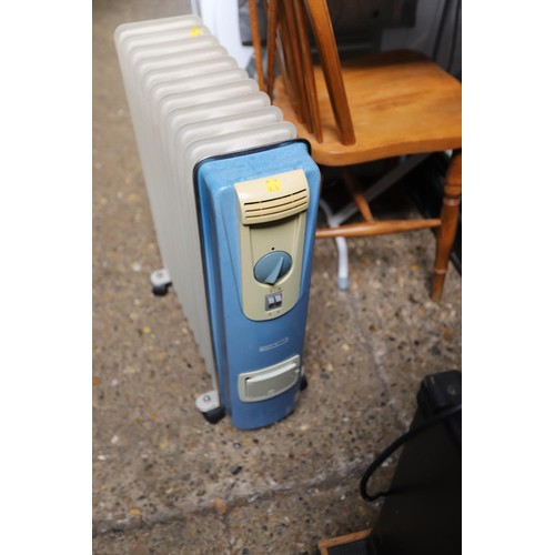 127 - Electric radiator heater - warranted until 12 noon Tuesday following the above sale