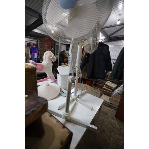 141 - 2 floor standing fans - warranted until 12 noon Tuesday following the above sale