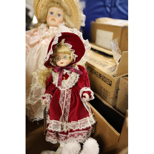 222 - 2 boxes of dolls & teddies