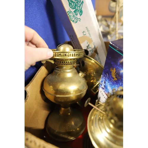 233 - Box of brass items, 2 oil lmps with glass, plant holders & engraved box