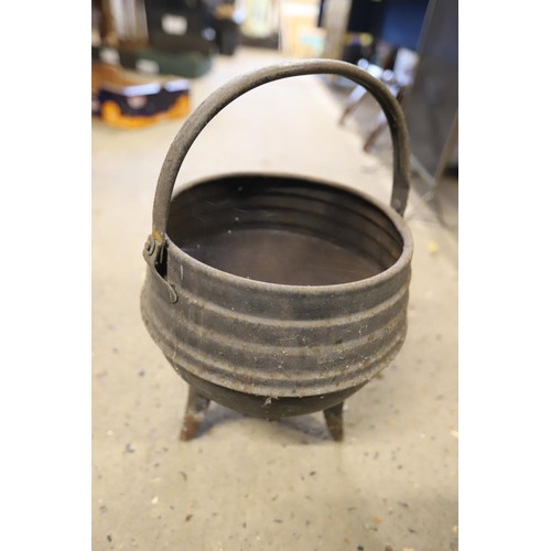 297 - Antique metal cauldron