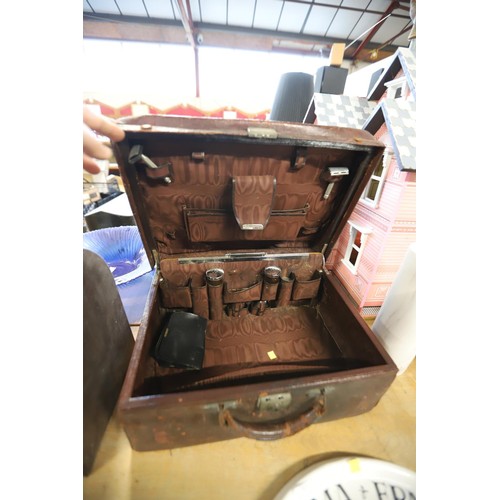 310 - Antique travelling leather vanity case with some accessories