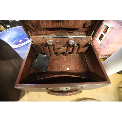 310 - Antique travelling leather vanity case with some accessories