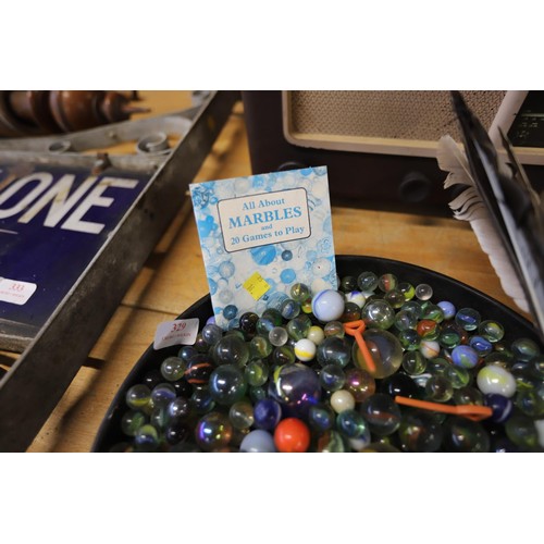 329 - Bowl of marbles & booklet