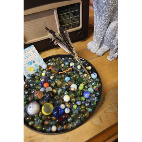 329 - Bowl of marbles & booklet