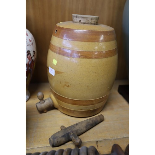 334 - Antique stone beer barrel with wooden tap