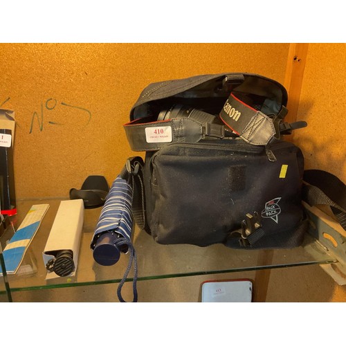 410 - Canon EOS 550D camera, incl 75–300 mm lens, 18–55 mm lens, spotting scope, bag, etc