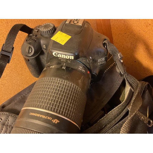 410 - Canon EOS 550D camera, incl 75–300 mm lens, 18–55 mm lens, spotting scope, bag, etc