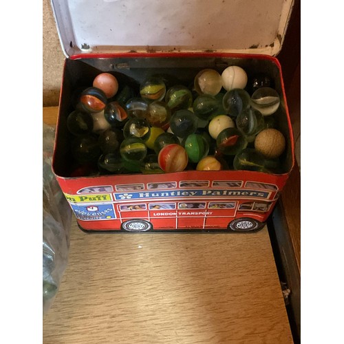 413 - Large qty of antique marbles, incl London bus tin