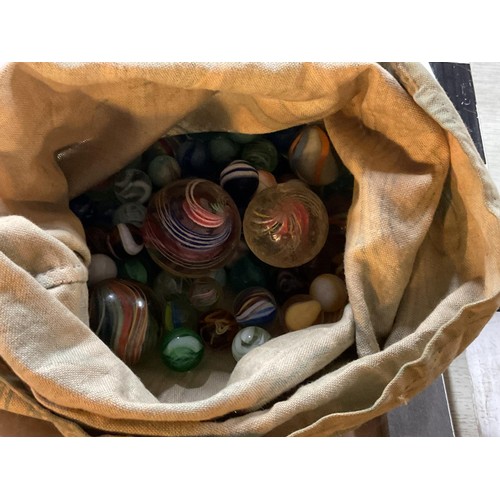 413 - Large qty of antique marbles, incl London bus tin