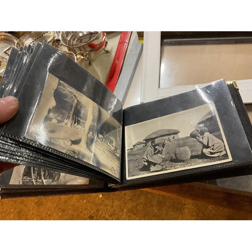 420 - Rare early photographic postcards of native African people & 1940's USA album of postcards