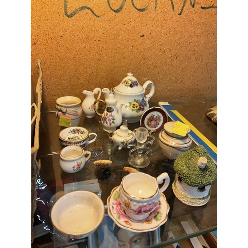 452 - Child's tea sets & miniature pottery for dolls house