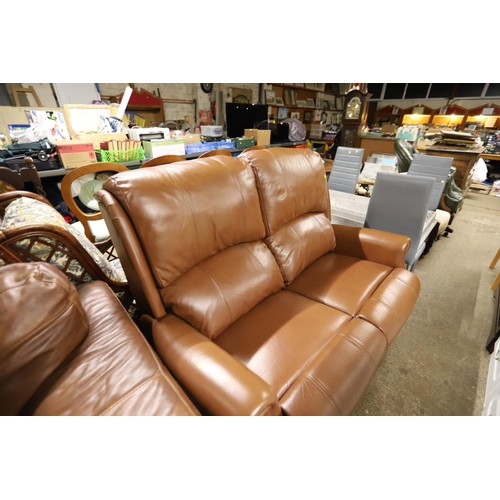 555 - Brown leather reclining settee