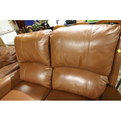 555 - Brown leather reclining settee