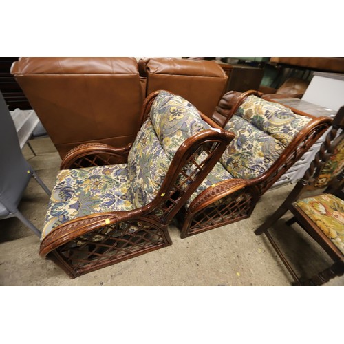 556 - Pair of wicker conservatory armchairs with cushions